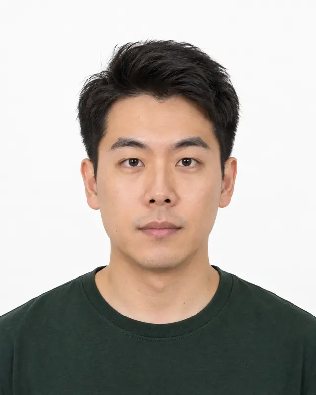 Face evenly lit, with no shadow on the face or wall.